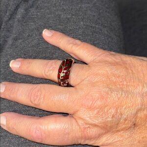 Pink stone with silver filigree design